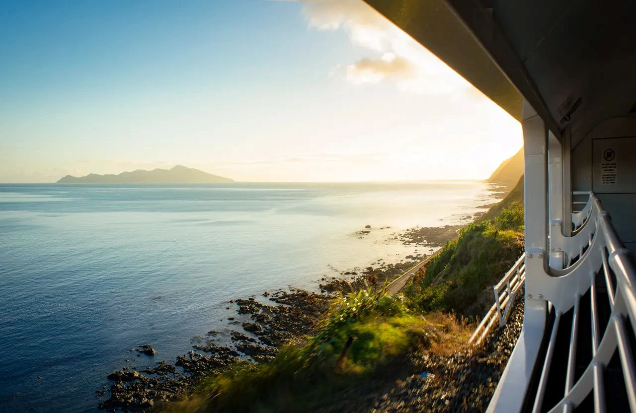 View over the Kapiti Coast from the Northern Explorer train open air viewing carriage