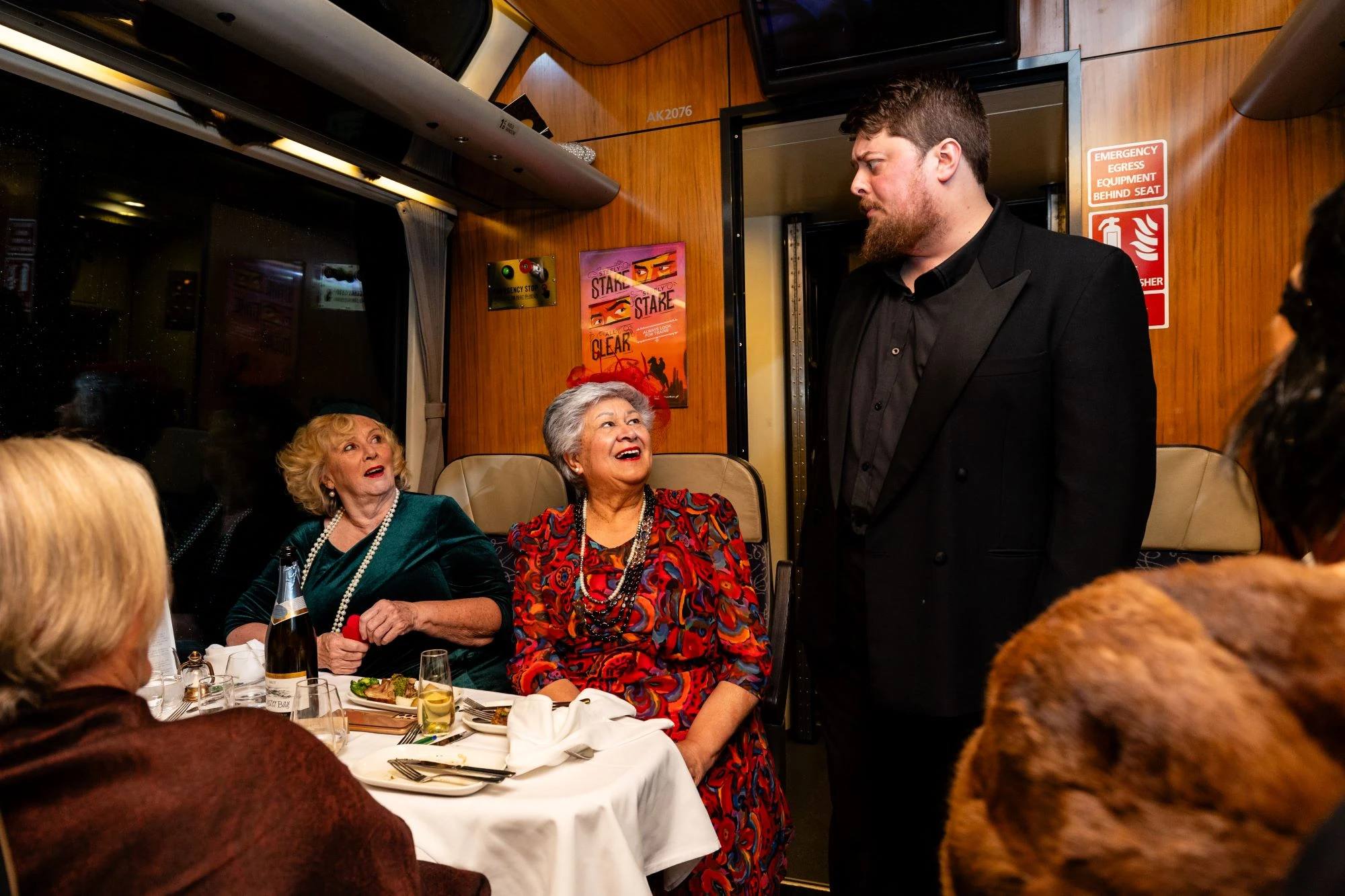 Court Theatre actor engaging with passengers on the Tormore Express train