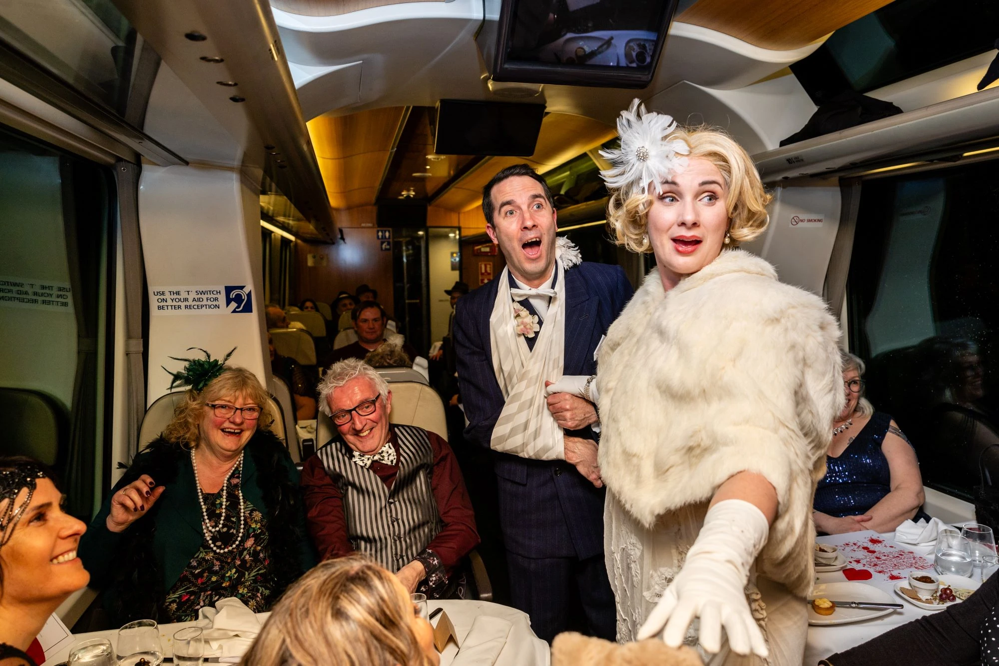 Court Theatre actors perform on the Tormore Express as passengers watch on