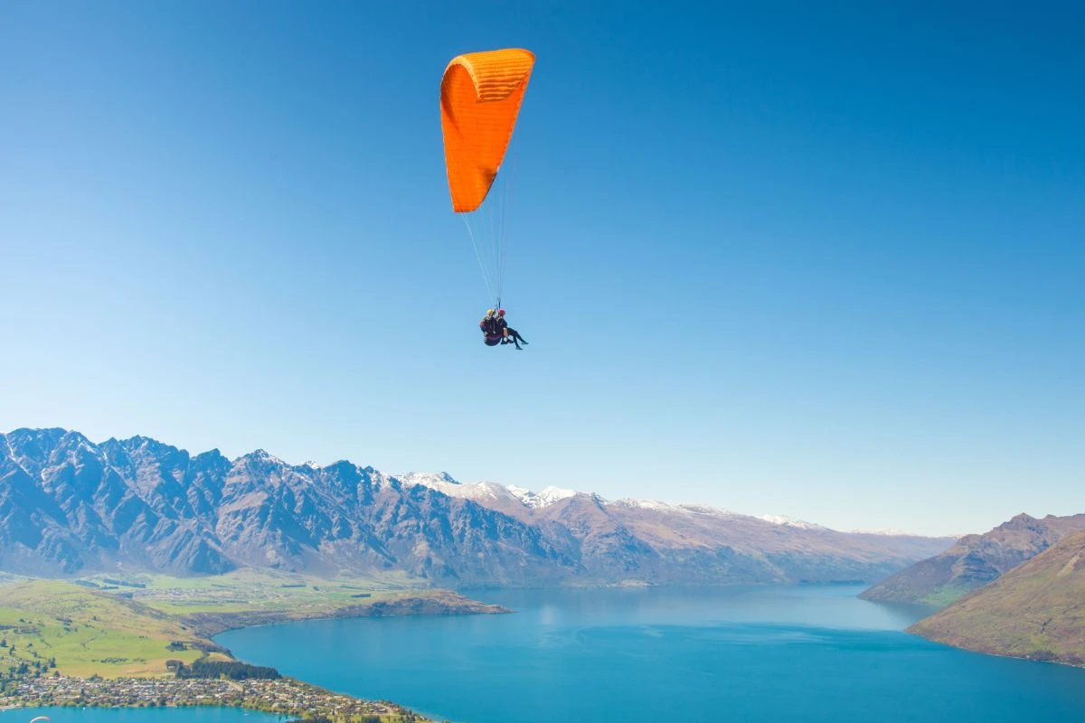 Watch the paragliders over Lake Wakatipu in Queenstown