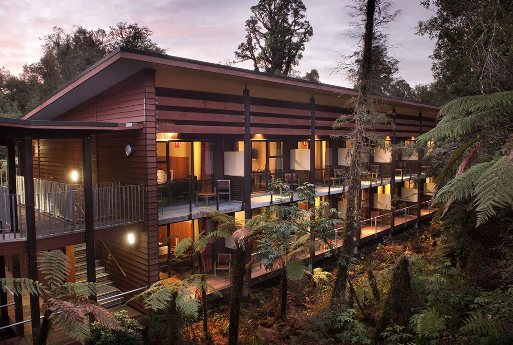 Te Waonui Forest Retreat embedded within the rainforest