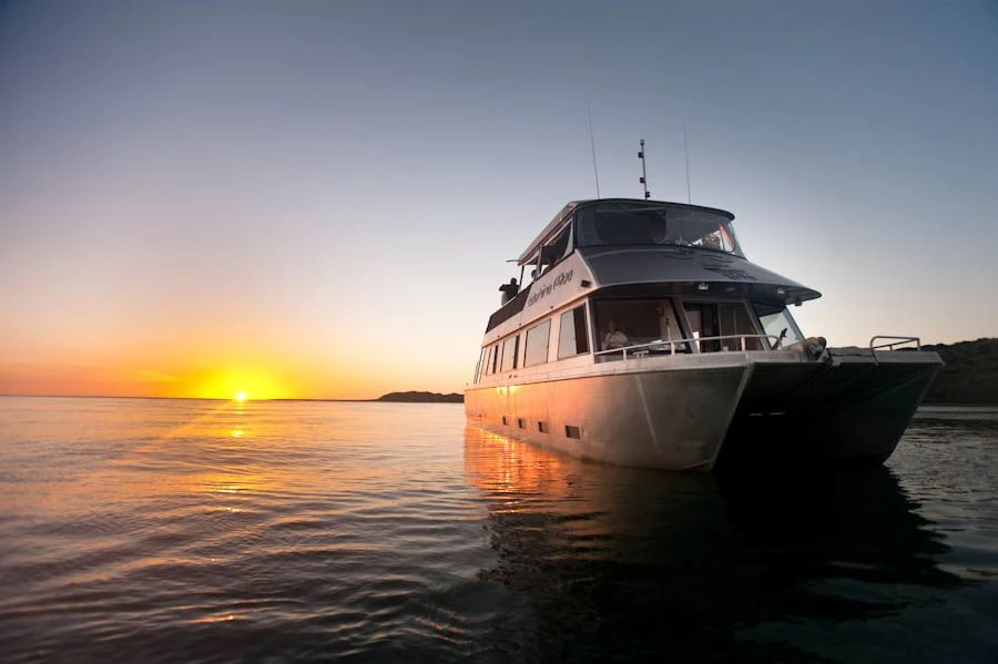 Boat in the Ragland harbour at sunset