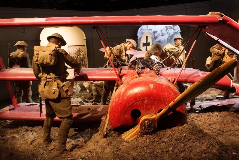 Omaka Aviation Heritage Centre exhibit with soldiers and a plane half buried