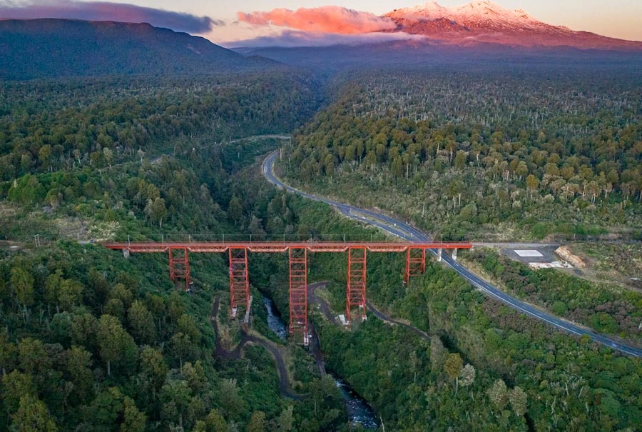 Rail crossing the Makatote Viaduct with views of Mt Ruapehu