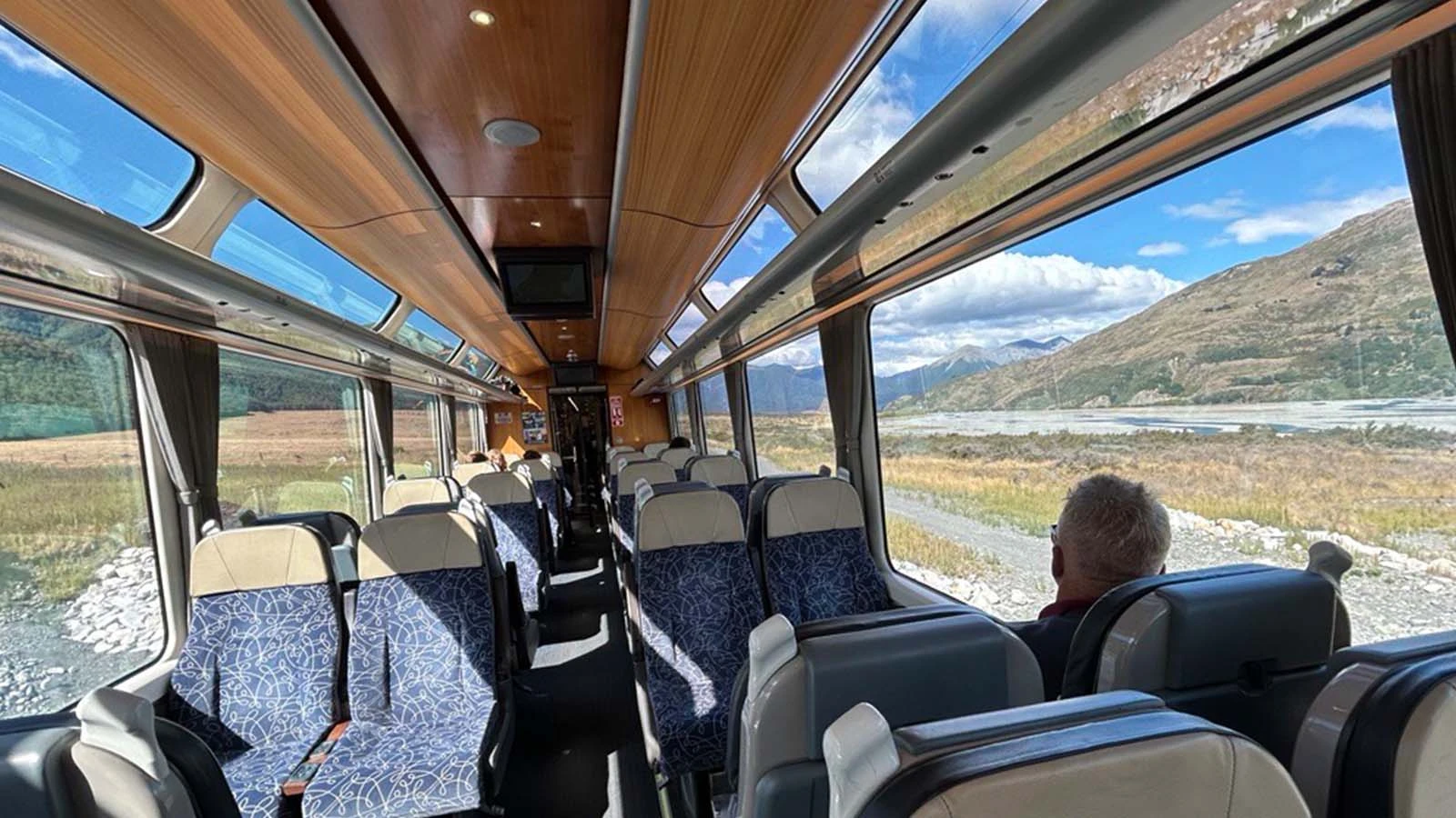 Large windows and comfortable seating on the TranzAlpine train