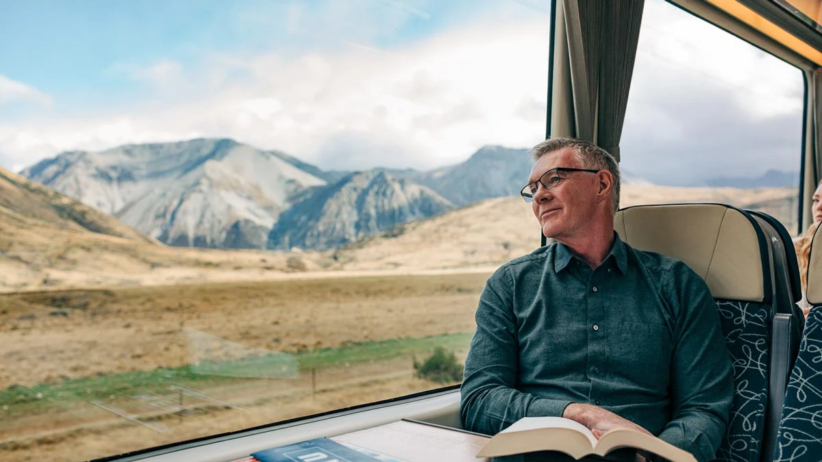 Large windows and comfortable seating onboard the TranzAlpine train